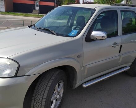 Серый Мазда Трибьют, объемом двигателя 3 л и пробегом 158 тыс. км за 5700 $, фото 1 на Automoto.ua