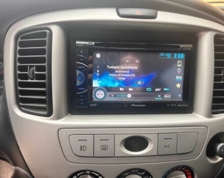 Серый Мазда Трибьют, объемом двигателя 3 л и пробегом 158 тыс. км за 5700 $, фото 10 на Automoto.ua