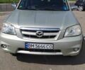 Серый Мазда Трибьют, объемом двигателя 3 л и пробегом 158 тыс. км за 5700 $, фото 3 на Automoto.ua