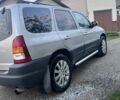 Сірий Мазда Трибьют, об'ємом двигуна 2 л та пробігом 185 тис. км за 5300 $, фото 1 на Automoto.ua