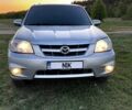 Сірий Мазда Трибьют, об'ємом двигуна 2.3 л та пробігом 250 тис. км за 6000 $, фото 1 на Automoto.ua