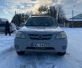 Сірий Мазда Трибьют, об'ємом двигуна 2.3 л та пробігом 294 тис. км за 2600 $, фото 1 на Automoto.ua