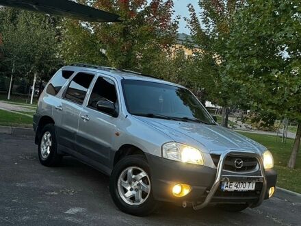 Сірий Мазда Трибьют, об'ємом двигуна 2 л та пробігом 230 тис. км за 3999 $, фото 1 на Automoto.ua