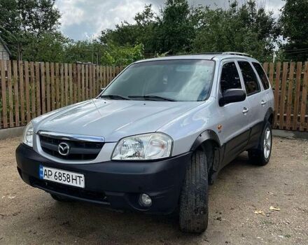 Сірий Мазда Трибьют, об'ємом двигуна 2 л та пробігом 350 тис. км за 4500 $, фото 1 на Automoto.ua