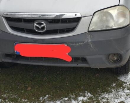 Серый Мазда Трибьют, объемом двигателя 2 л и пробегом 366 тыс. км за 2200 $, фото 1 на Automoto.ua