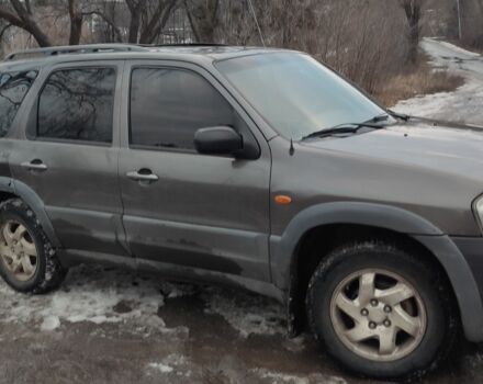 Серый Мазда Трибьют, объемом двигателя 2 л и пробегом 270 тыс. км за 2350 $, фото 1 на Automoto.ua