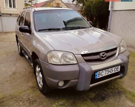 Сірий Мазда Трибьют, об'ємом двигуна 2 л та пробігом 301 тис. км за 5200 $, фото 1 на Automoto.ua