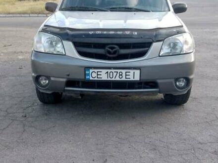 Серый Мазда Трибьют, объемом двигателя 3 л и пробегом 297 тыс. км за 6600 $, фото 1 на Automoto.ua