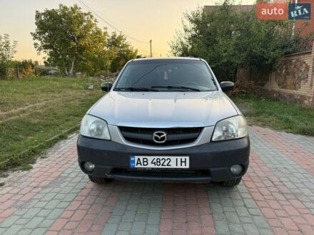 Серый Мазда Трибьют, объемом двигателя 2 л и пробегом 300 тыс. км за 3900 $, фото 1 на Automoto.ua