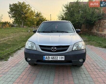 Серый Мазда Трибьют, объемом двигателя 2 л и пробегом 300 тыс. км за 3900 $, фото 1 на Automoto.ua