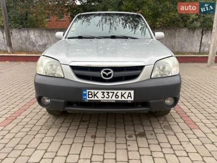 Серый Мазда Трибьют, объемом двигателя 1.99 л и пробегом 127 тыс. км за 6800 $, фото 1 на Automoto.ua