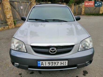Сірий Мазда Трибьют, об'ємом двигуна 3 л та пробігом 275 тис. км за 4800 $, фото 1 на Automoto.ua