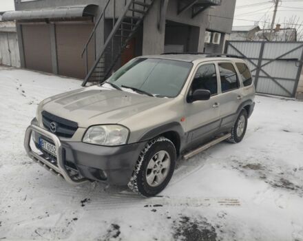 Серый Мазда Трибьют, объемом двигателя 3 л и пробегом 290 тыс. км за 5300 $, фото 1 на Automoto.ua