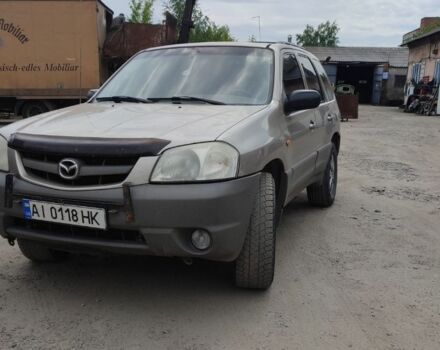 Сірий Мазда Трибьют, об'ємом двигуна 2 л та пробігом 307 тис. км за 2700 $, фото 1 на Automoto.ua