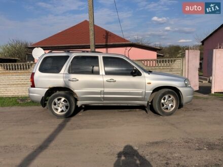 Сірий Мазда Трибьют, об'ємом двигуна 2 л та пробігом 215 тис. км за 3999 $, фото 1 на Automoto.ua