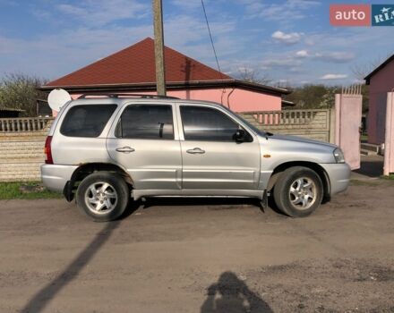 Серый Мазда Трибьют, объемом двигателя 2 л и пробегом 215 тыс. км за 3999 $, фото 1 на Automoto.ua
