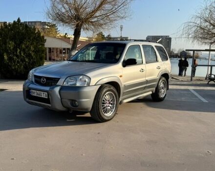 Серый Мазда Трибьют, объемом двигателя 2.97 л и пробегом 299 тыс. км за 5999 $, фото 1 на Automoto.ua