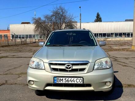 Сірий Мазда Трибьют, об'ємом двигуна 3 л та пробігом 159 тис. км за 5999 $, фото 1 на Automoto.ua