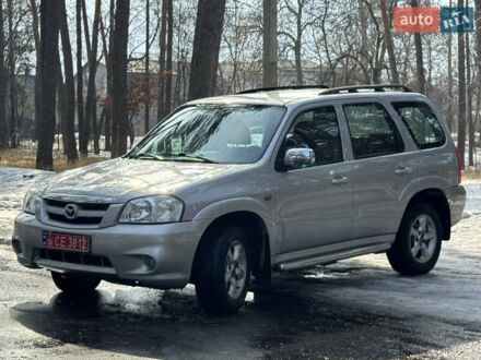 Серый Мазда Трибьют, объемом двигателя 2.3 л и пробегом 208 тыс. км за 5800 $, фото 1 на Automoto.ua