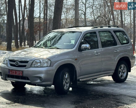 Серый Мазда Трибьют, объемом двигателя 2.3 л и пробегом 208 тыс. км за 5800 $, фото 1 на Automoto.ua