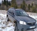 Синий Мазда Трибьют, объемом двигателя 2 л и пробегом 450 тыс. км за 5000 $, фото 1 на Automoto.ua