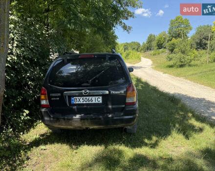 Синий Мазда Трибьют, объемом двигателя 3 л и пробегом 164 тыс. км за 5100 $, фото 1 на Automoto.ua