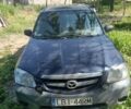Синій Мазда Трибьют, об'ємом двигуна 2 л та пробігом 270 тис. км за 2006 $, фото 1 на Automoto.ua