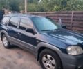 Синий Мазда Трибьют, объемом двигателя 3 л и пробегом 301 тыс. км за 2000 $, фото 1 на Automoto.ua