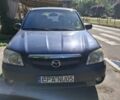 Синій Мазда Трибьют, об'ємом двигуна 2 л та пробігом 355 тис. км за 4506 $, фото 1 на Automoto.ua