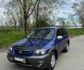 Синий Мазда Трибьют, объемом двигателя 2.3 л и пробегом 246 тыс. км за 6500 $, фото 1 на Automoto.ua