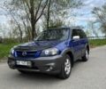 Синій Мазда Трибьют, об'ємом двигуна 2.3 л та пробігом 246 тис. км за 5600 $, фото 1 на Automoto.ua