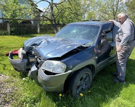 Синій Мазда Трибьют, об'ємом двигуна 3 л та пробігом 200 тис. км за 2600 $, фото 1 на Automoto.ua