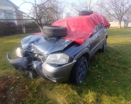 Синий Мазда Трибьют, объемом двигателя 0 л и пробегом 200 тыс. км за 2100 $, фото 1 на Automoto.ua