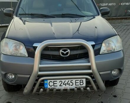 Синий Мазда Трибьют, объемом двигателя 3 л и пробегом 385 тыс. км за 5950 $, фото 1 на Automoto.ua