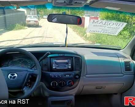 Синий Мазда Трибьют, объемом двигателя 3 л и пробегом 392 тыс. км за 4999 $, фото 1 на Automoto.ua