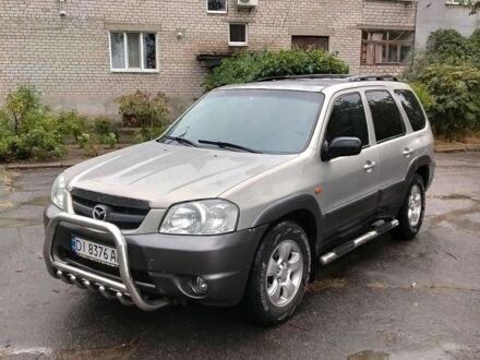 Синій Мазда Трибьют, об'ємом двигуна 2.97 л та пробігом 212 тис. км за 3000 $, фото 1 на Automoto.ua