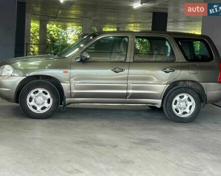 Зелений Мазда Трибьют, об'ємом двигуна 2 л та пробігом 358 тис. км за 3800 $, фото 2 на Automoto.ua