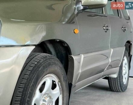 Зелений Мазда Трибьют, об'ємом двигуна 2 л та пробігом 358 тис. км за 3800 $, фото 5 на Automoto.ua