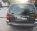 Зеленый Мазда Трибьют, объемом двигателя 2 л и пробегом 320 тыс. км за 4800 $, фото 1 на Automoto.ua