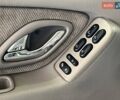 Зеленый Мазда Трибьют, объемом двигателя 2 л и пробегом 358 тыс. км за 4500 $, фото 7 на Automoto.ua