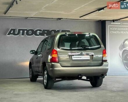 Зелений Мазда Трибьют, об'ємом двигуна 2 л та пробігом 358 тис. км за 3800 $, фото 1 на Automoto.ua