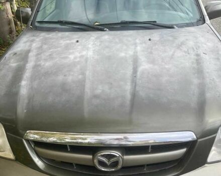 Зелений Мазда Трибьют, об'ємом двигуна 2 л та пробігом 358 тис. км за 3800 $, фото 12 на Automoto.ua