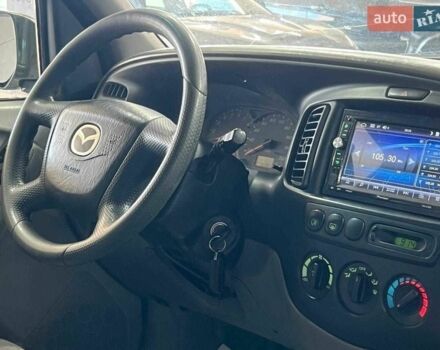 Зелений Мазда Трибьют, об'ємом двигуна 2 л та пробігом 358 тис. км за 3800 $, фото 3 на Automoto.ua