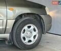 Зеленый Мазда Трибьют, объемом двигателя 2 л и пробегом 358 тыс. км за 4500 $, фото 2 на Automoto.ua