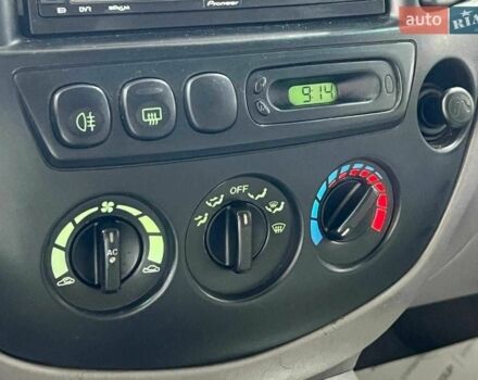 Зелений Мазда Трибьют, об'ємом двигуна 2 л та пробігом 358 тис. км за 3800 $, фото 11 на Automoto.ua