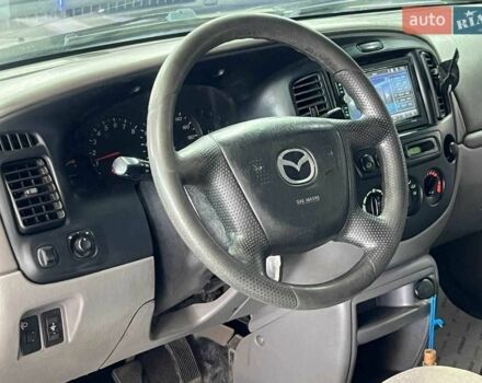 Зелений Мазда Трибьют, об'ємом двигуна 2 л та пробігом 358 тис. км за 3800 $, фото 8 на Automoto.ua