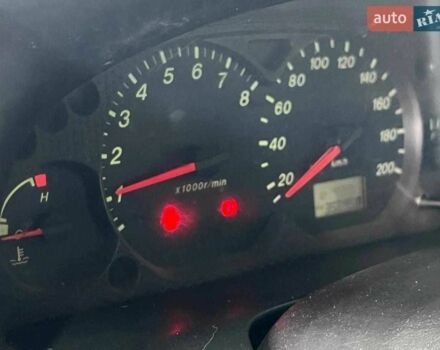 Зелений Мазда Трибьют, об'ємом двигуна 2 л та пробігом 358 тис. км за 3800 $, фото 6 на Automoto.ua