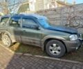 Зеленый Мазда Трибьют, объемом двигателя 3 л и пробегом 200 тыс. км за 2075 $, фото 1 на Automoto.ua