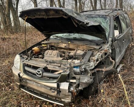 Зеленый Мазда Трибьют, объемом двигателя 3 л и пробегом 219 тыс. км за 2000 $, фото 3 на Automoto.ua