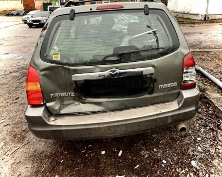 Зеленый Мазда Трибьют, объемом двигателя 3 л и пробегом 219 тыс. км за 2000 $, фото 4 на Automoto.ua